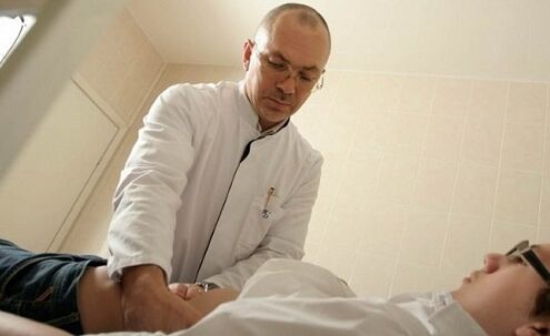 Doctor examines a patient with prostatitis